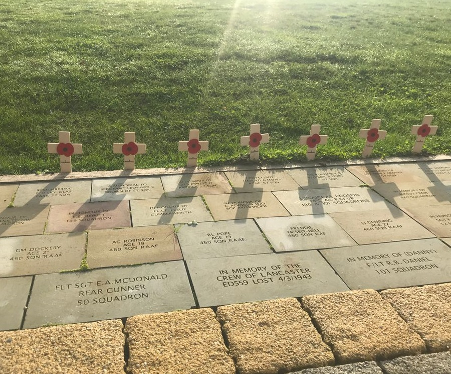 Seven remembrance crosses at the The International Bomber Command Centre (IBCC), Lincoln. At front a memorial stone to the crew of Lancaster ED559.
